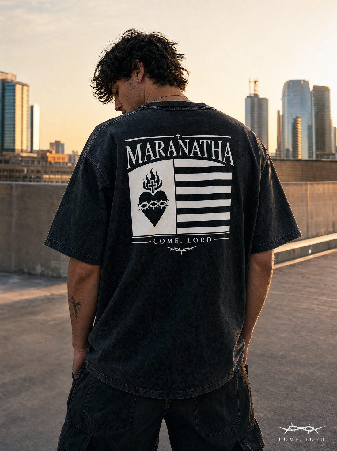 Smoky Black Christian t-shirt — Sacred Heart devotional plate back print, city rooftop — Sacred Heart Tee